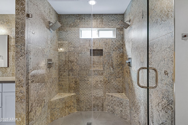 bathroom featuring a shower stall