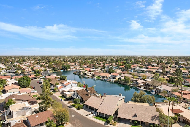 aerial view with a water view and a residential view