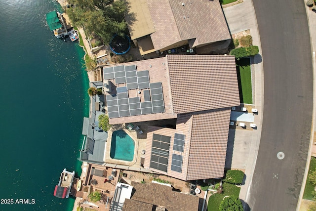 bird's eye view with a water view