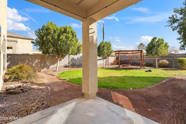 view of yard featuring a patio and a pergola