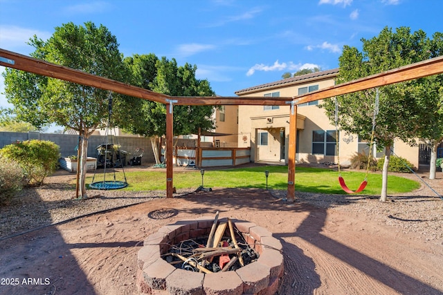 view of patio featuring an outdoor fire pit