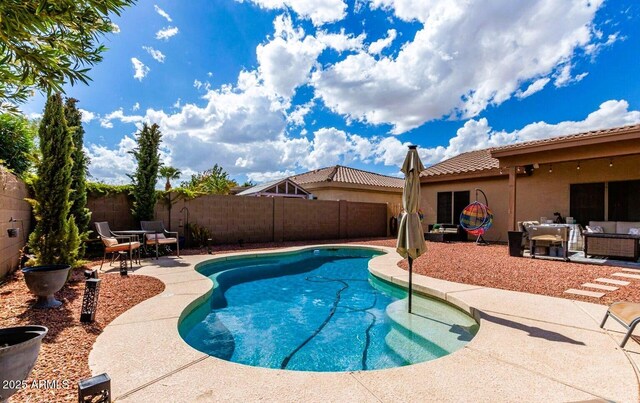 2685 N 132nd Dr, Goodyear, AZ 85395 - view of pool with a patio, a fenced backyard, and an outdoor hangout area
