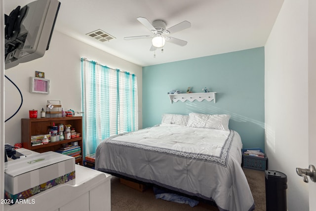 carpeted bedroom with ceiling fan