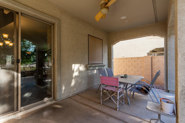 view of patio / terrace featuring ceiling fan