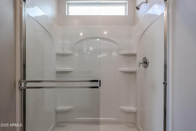 bathroom with a stall shower