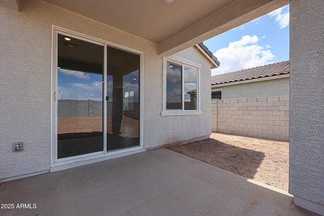 view of patio / terrace with fence