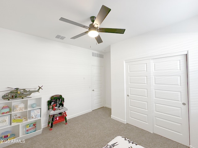 game room featuring carpet, visible vents, ceiling fan, and baseboards