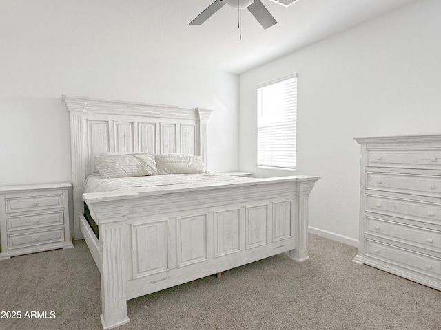 bedroom with carpet, ceiling fan, and baseboards