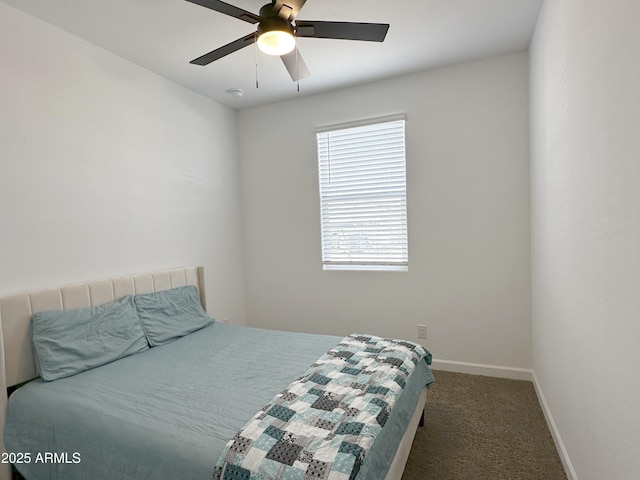 bedroom featuring carpet, baseboards, and a ceiling fan