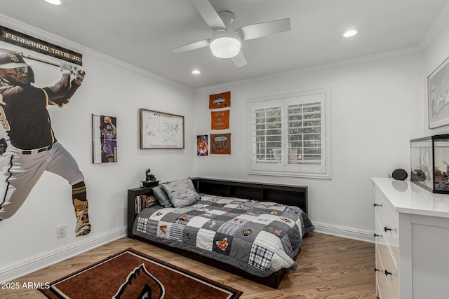 bedroom with crown molding, baseboards, wood finished floors, recessed lighting, and a ceiling fan