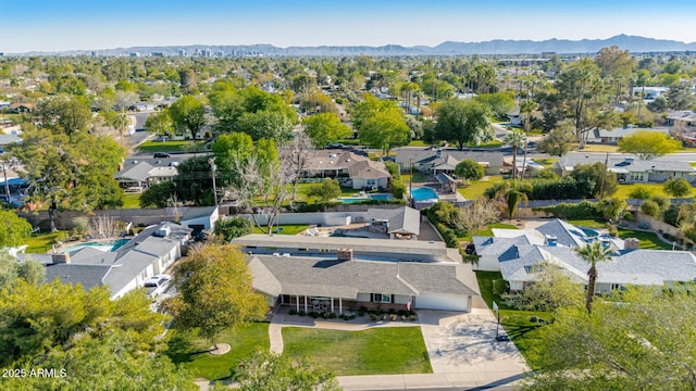 birds eye view of property featuring a residential view and a mountain view