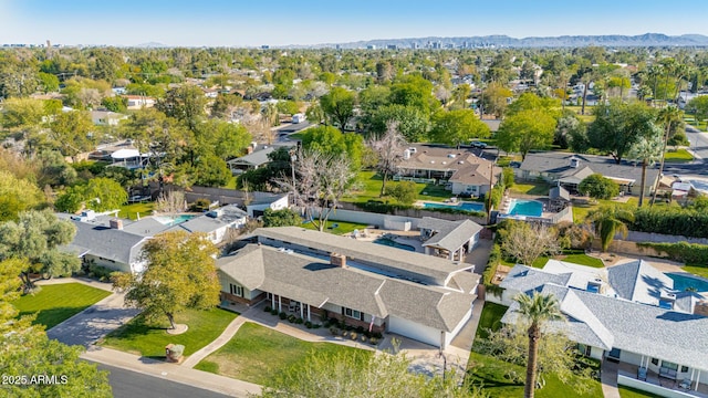 bird's eye view featuring a residential view and a mountain view