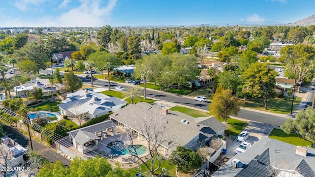 birds eye view of property with a residential view