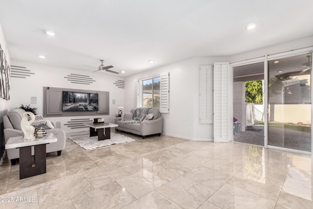 living room with ceiling fan