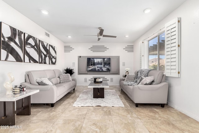 living room featuring ceiling fan