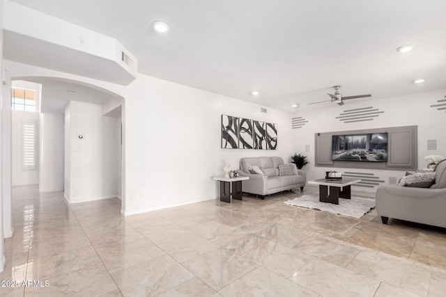 living room featuring ceiling fan