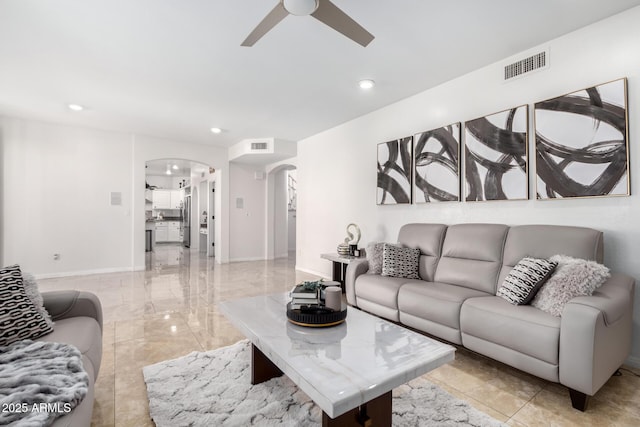 living room featuring ceiling fan