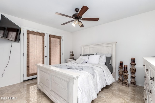 bedroom with ceiling fan and access to outside