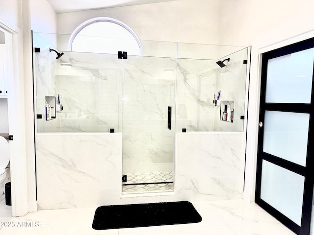 5748 W Soft Wind Dr, Glendale, AZ 85310 - bathroom with a marble finish shower and toilet
