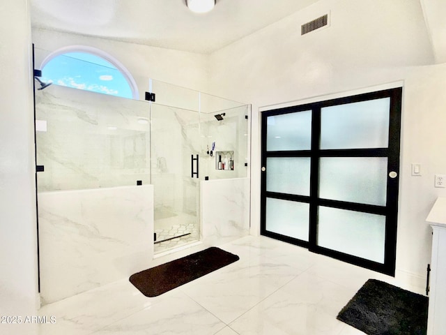 5748 W Soft Wind Dr, Glendale, AZ 85310 - bathroom featuring visible vents, marble finish floor, and a marble finish shower