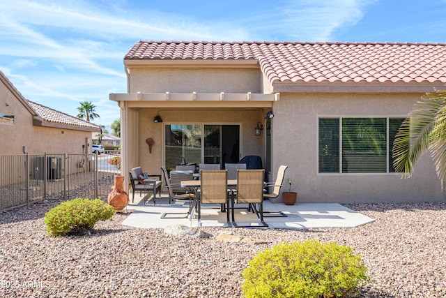 back of house featuring a patio