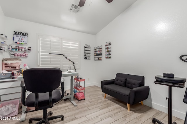 office area with vaulted ceiling and ceiling fan