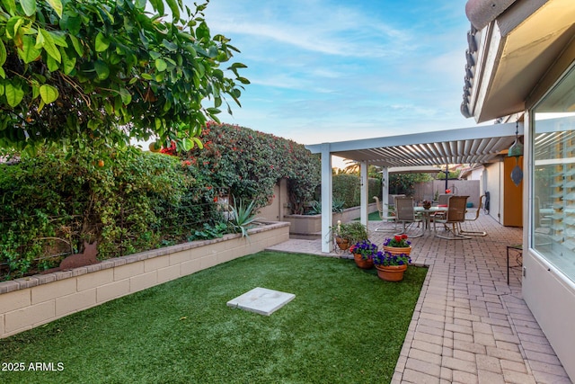 view of yard featuring outdoor dining area, a patio area, a fenced backyard, and a pergola