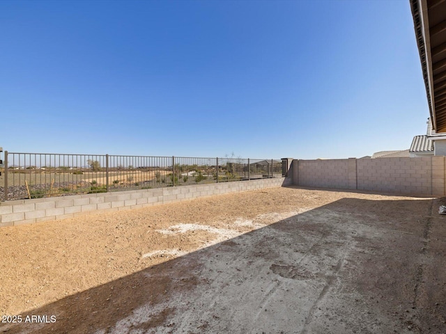 view of yard with a fenced backyard