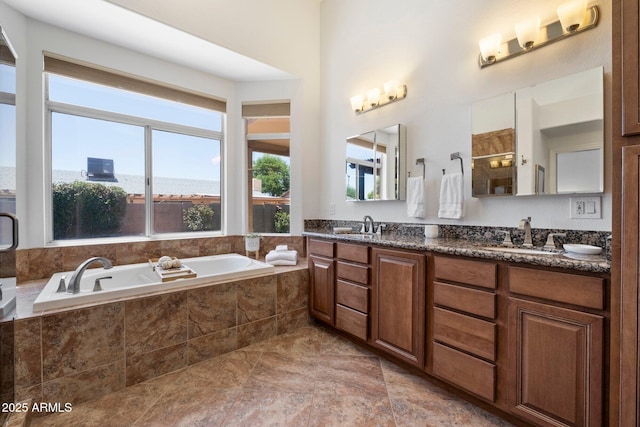 15020 N 54th Pl, Scottsdale, AZ 85254 - bathroom featuring healthy amount of natural light, double vanity, a bath, and tiled shower