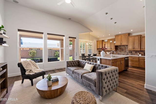 15020 N 54th Pl, Scottsdale, AZ 85254 - living area featuring lofted ceiling, plenty of natural light, dark wood-type flooring, a ceiling fan, and recessed lighting