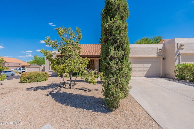 view of front of home with a garage