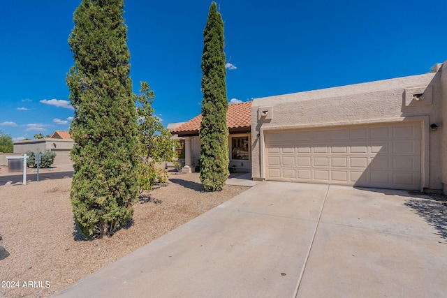 view of front of property featuring a garage