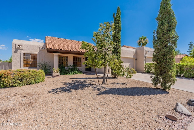 view of front of property with a garage