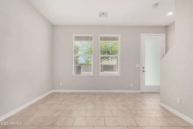 2000 N 36th St Unit 30, Phoenix, AZ 85008 - spare room featuring a smoke detector and light tile patterned floors