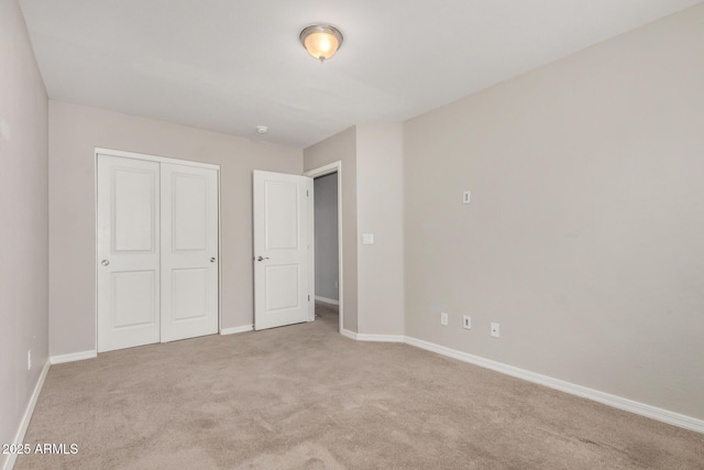 2000 N 36th St Unit 30, Phoenix, AZ 85008 - unfurnished bedroom featuring carpet flooring and a closet