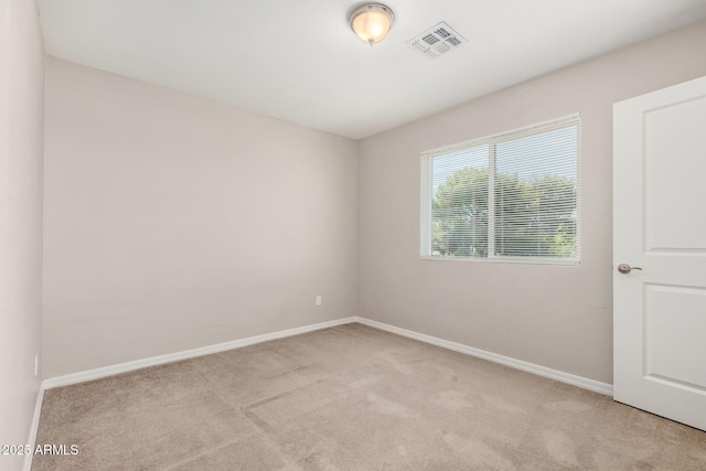 2000 N 36th St Unit 30, Phoenix, AZ 85008 - spare room with light carpet and baseboards