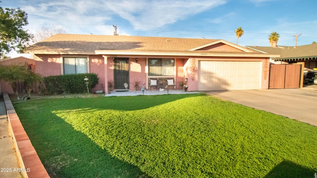 ranch-style house with a garage and a front lawn