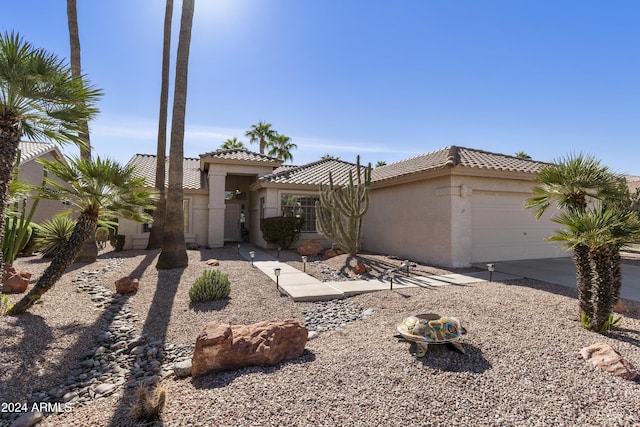 view of front of property with a garage