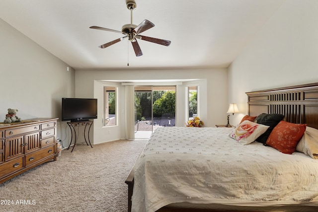 bedroom with ceiling fan, access to exterior, light carpet, and lofted ceiling