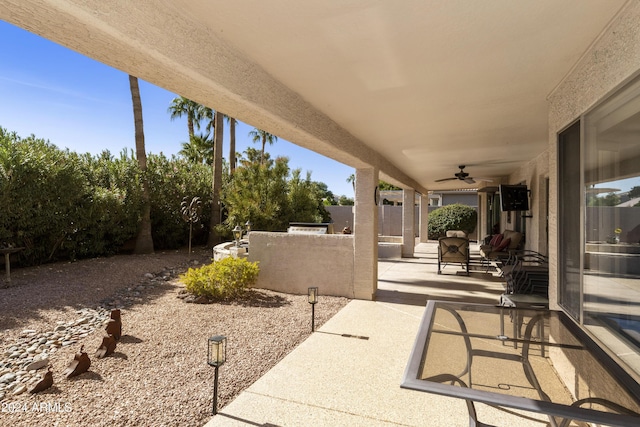 view of patio with ceiling fan