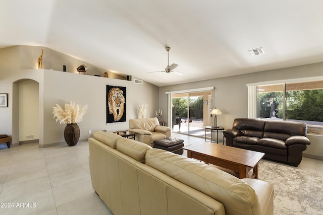 tiled living room featuring lofted ceiling and ceiling fan