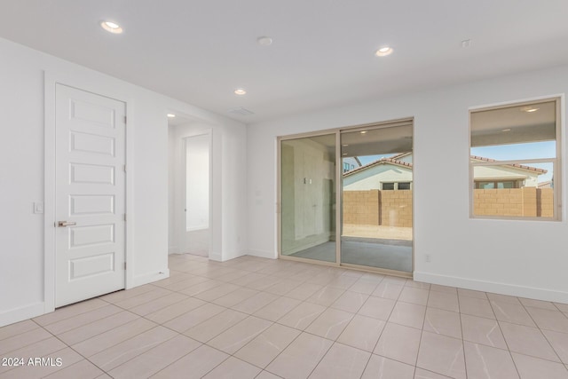 21354 E Sparrow Dr, Queen Creek, AZ 85142 - empty room featuring baseboards, recessed lighting, and light tile patterned floors