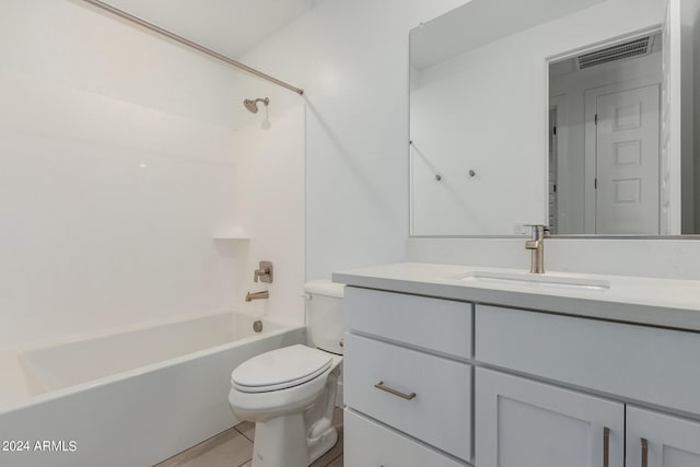 full bathroom with vanity, toilet, tile patterned floors, and shower / bathing tub combination