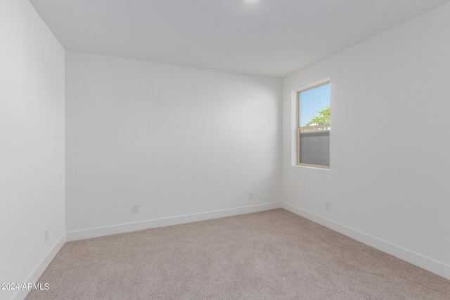 21354 E Sparrow Dr, Queen Creek, AZ 85142 - unfurnished room featuring light colored carpet and baseboards