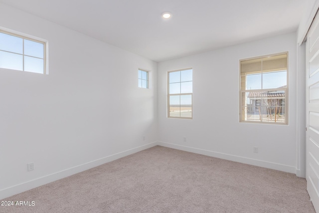 21354 E Sparrow Dr, Queen Creek, AZ 85142 - empty room featuring baseboards, light colored carpet, and recessed lighting