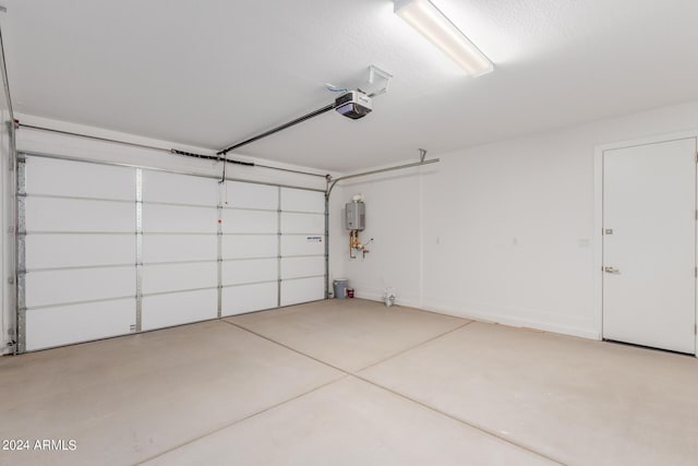 21354 E Sparrow Dr, Queen Creek, AZ 85142 - garage with tankless water heater and a garage door opener