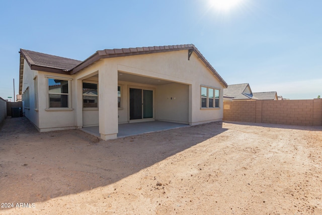 rear view of property with a patio area