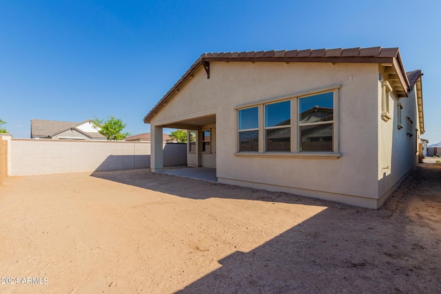 21354 E Sparrow Dr, Queen Creek, AZ 85142 - rear view of house with a patio, fence, and stucco siding