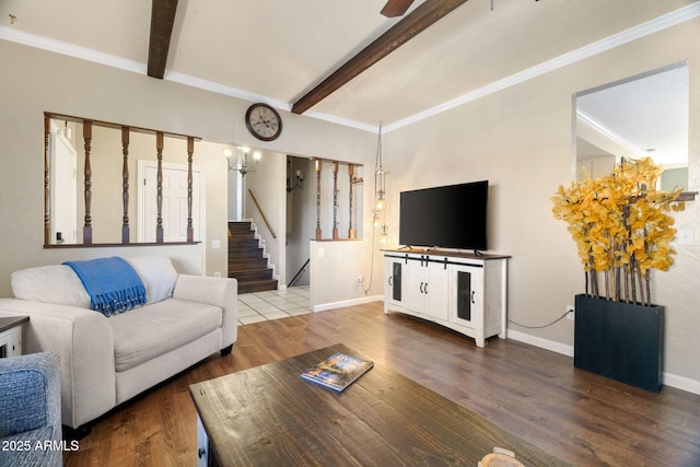 living room with hardwood / wood-style floors, ornamental molding, and beamed ceiling