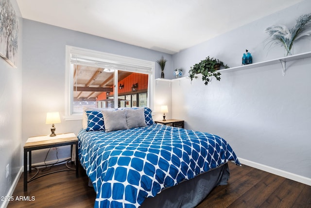 bedroom with hardwood / wood-style flooring